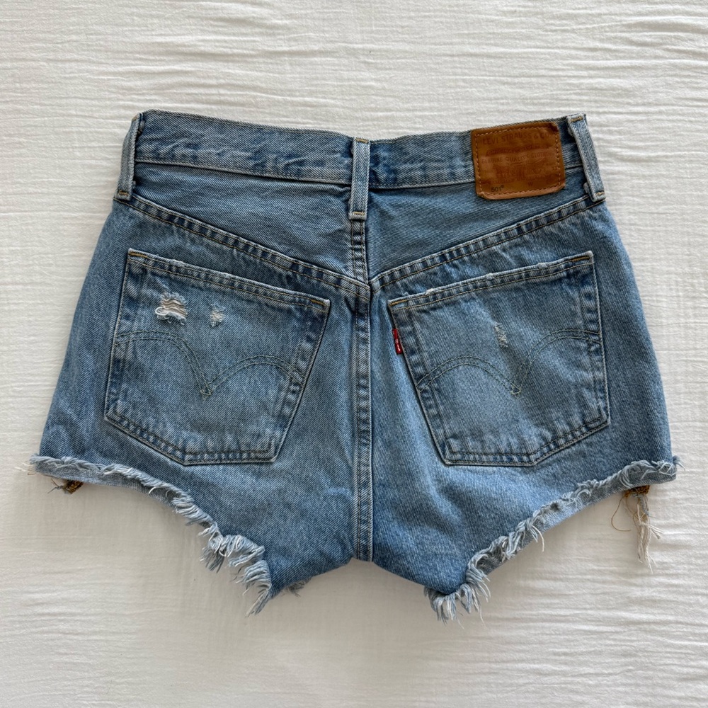 Vintage Levi’s 501 distressed cut off denim shorts